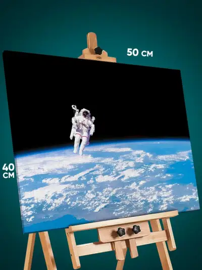 Картина на стену Космос космонавт на орбите Земли 40x50